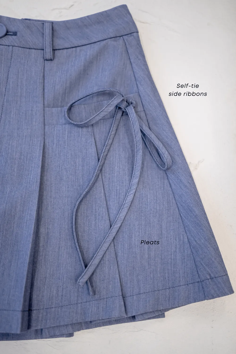 CLARE PLEATED TIE-KNOT SKORTS IN BLUE