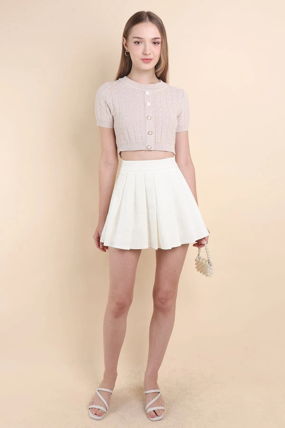 RESTOCKED** CAMU PLEATED SKIRT IN CREAM WHITE