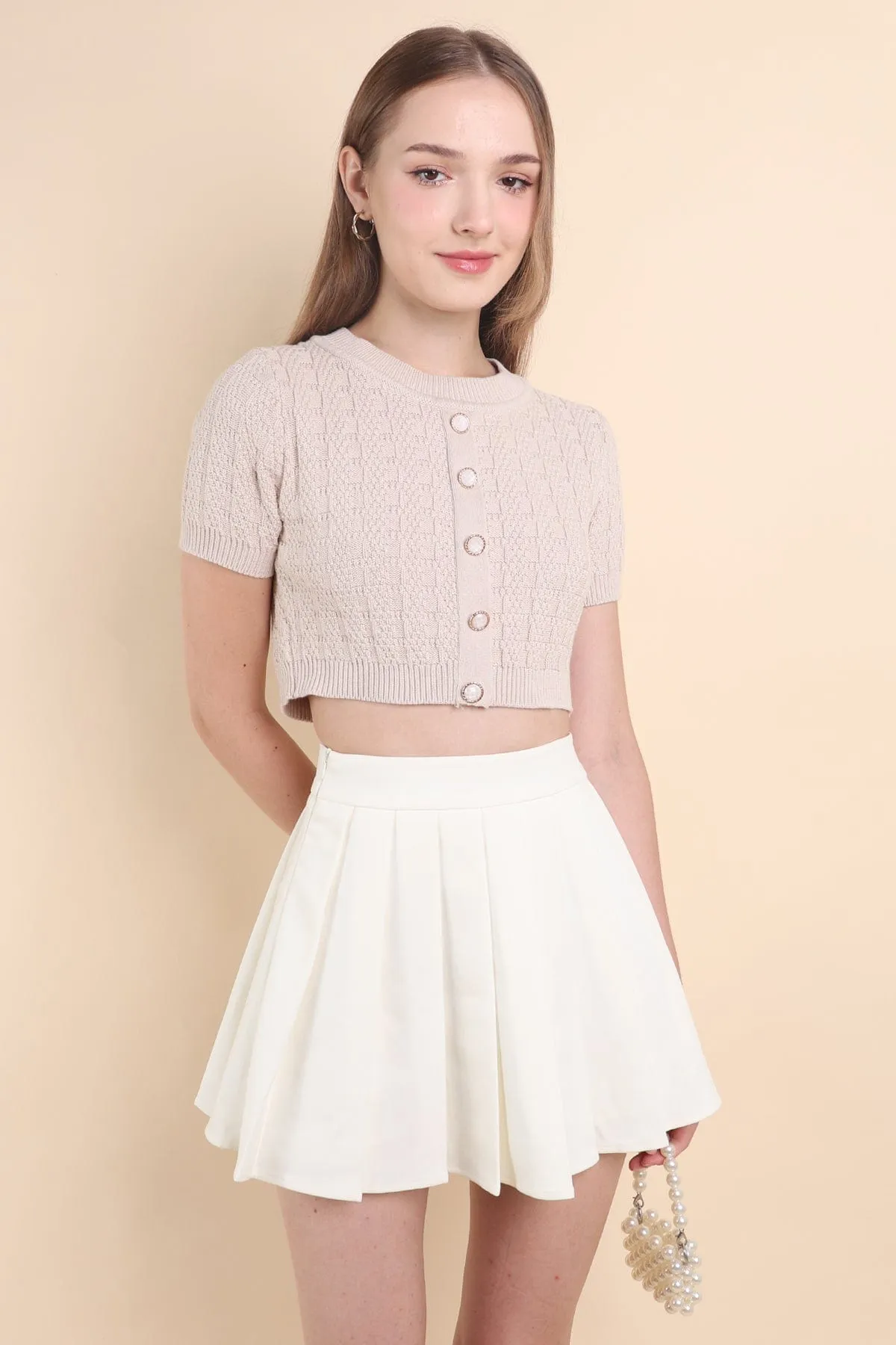 RESTOCKED** CAMU PLEATED SKIRT IN CREAM WHITE