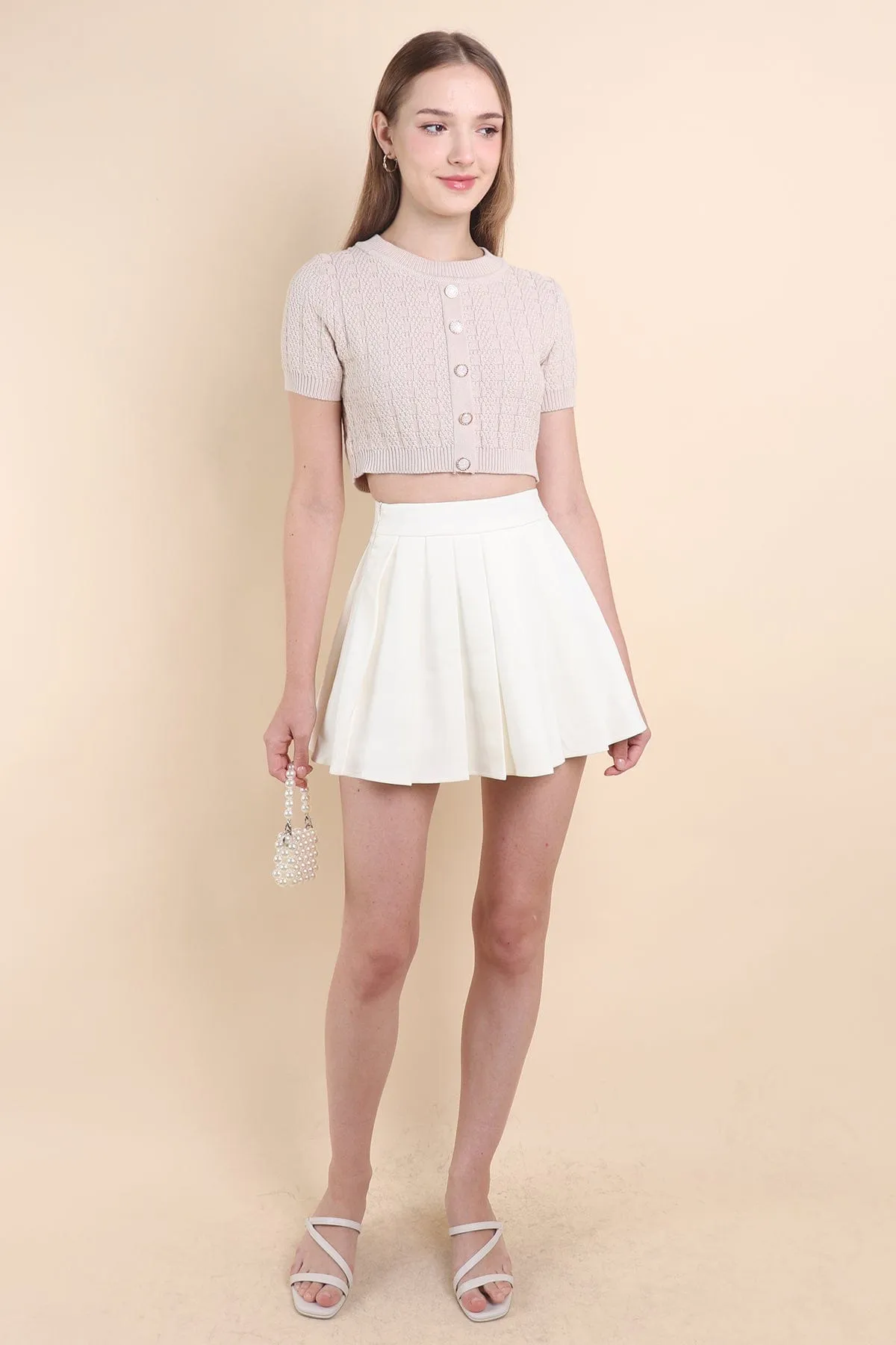 RESTOCKED** CAMU PLEATED SKIRT IN CREAM WHITE